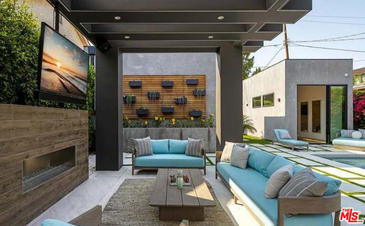 1371 Palms Boulevard Venice, CA 90291 - Photo 12 of 21 a living room with furniture and a fireplace