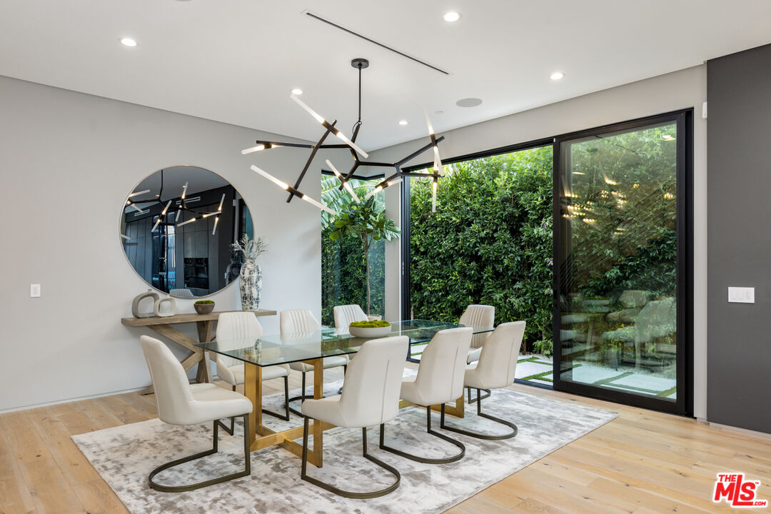 1371 Palms Boulevard Venice, CA 90291 - Photo 7 of 21 a view of a dining room with furniture wooden floor and chandelier