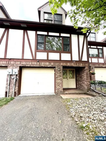 a view of a park with plants and trees