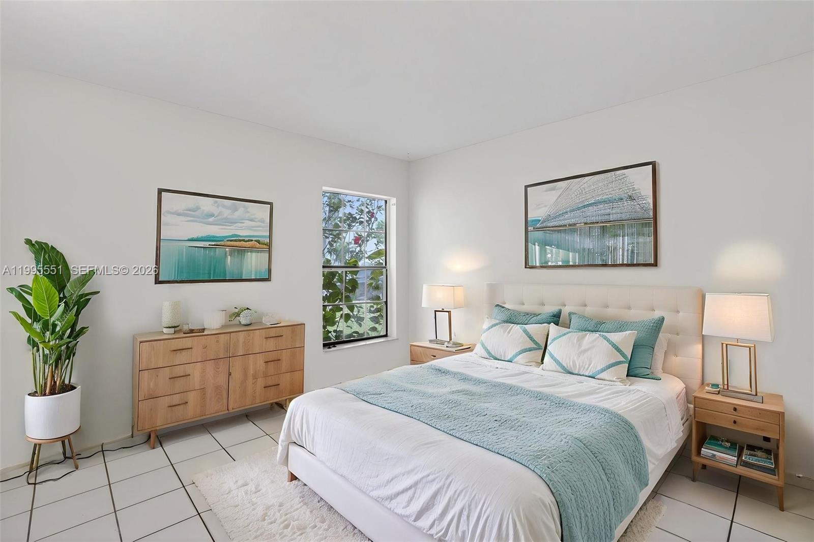 14722 Southwest 110th Terrace Miami, FL 33196 - Photo 19 of 37 a bedroom with a bed and a couch