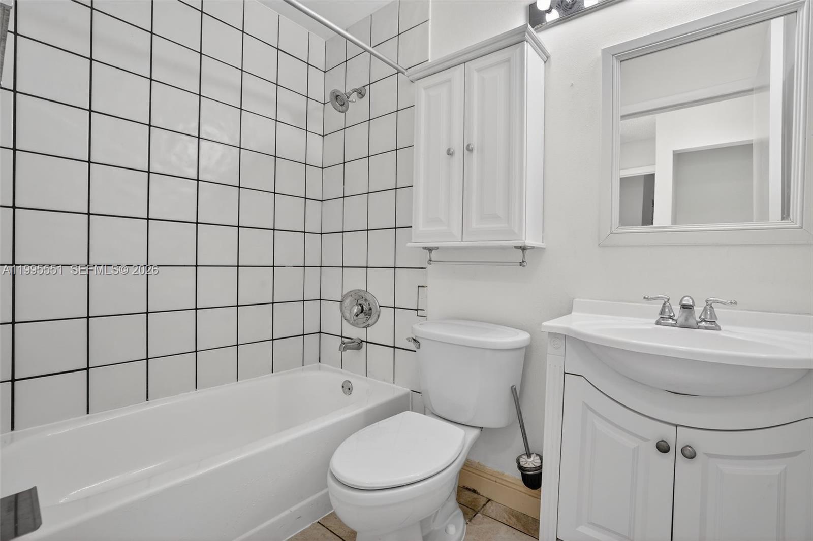 14722 Southwest 110th Terrace Miami, FL 33196 - Photo 21 of 37 a bathroom with a sink a toilet and shower