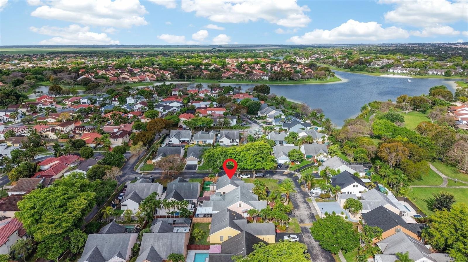 14722 Southwest 110th Terrace Miami, FL 33196 - Photo 36 of 37 an aerial view of lake and houses with outdoor space