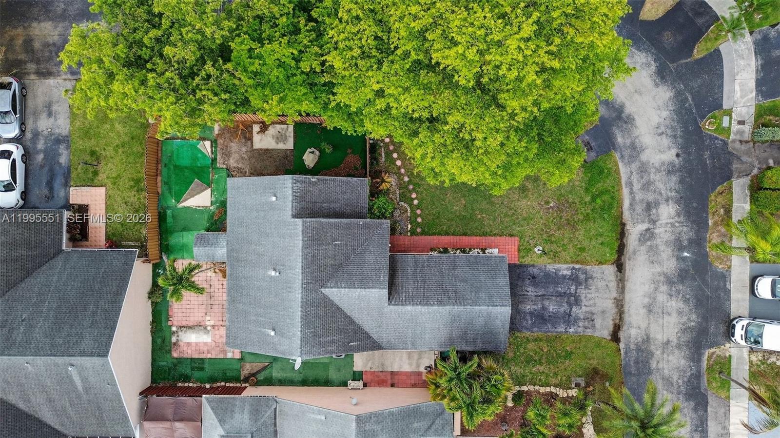 14722 Southwest 110th Terrace Miami, FL 33196 - Photo 37 of 37 an aerial view of a house with a yard