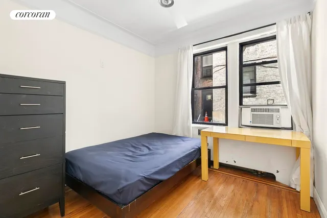 a workspace with furniture and window