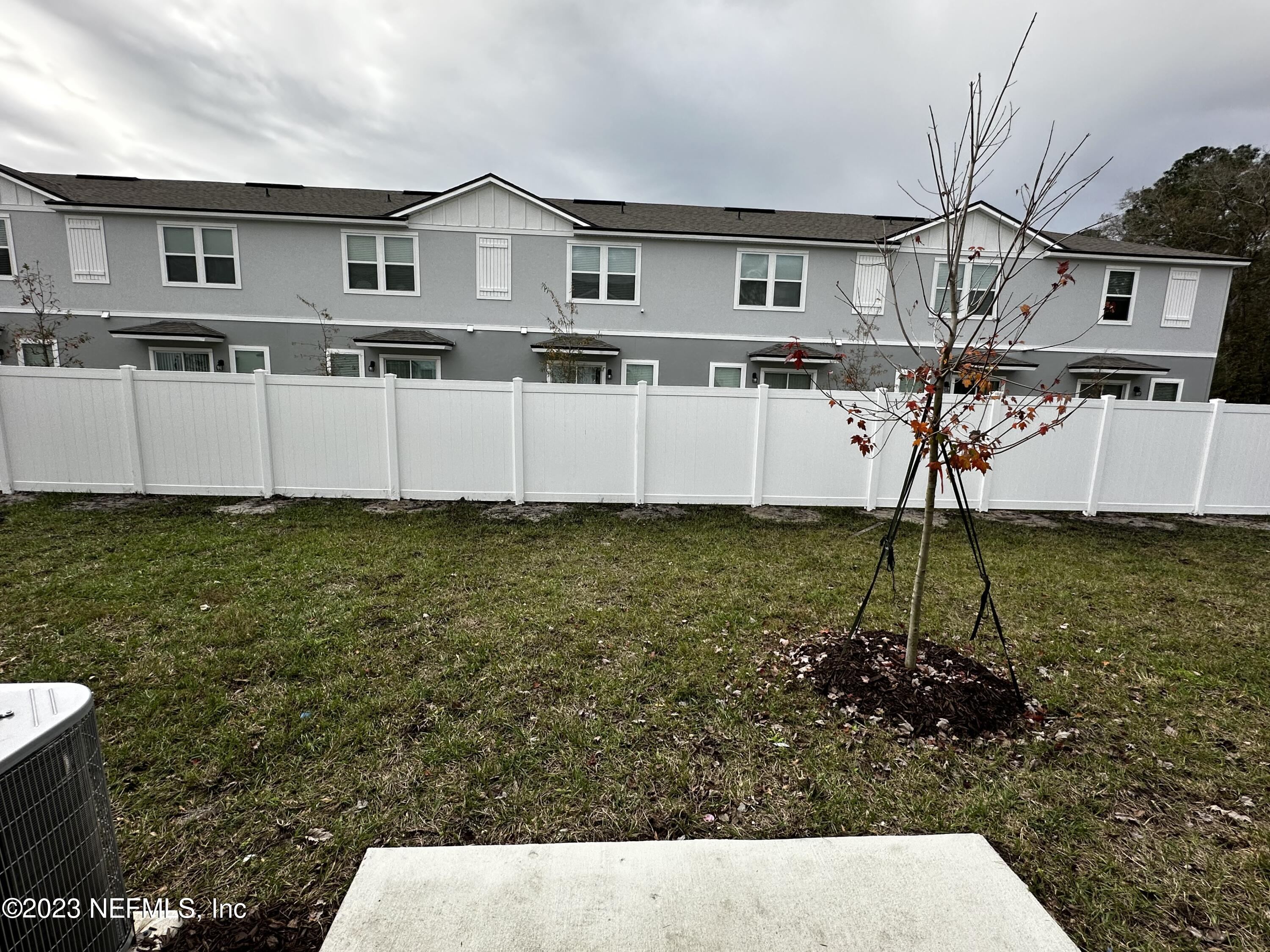 400 Talulla Trail St. Augustine, FL 32095 - Photo 55 of 58 a white house that has a lot of plants in it