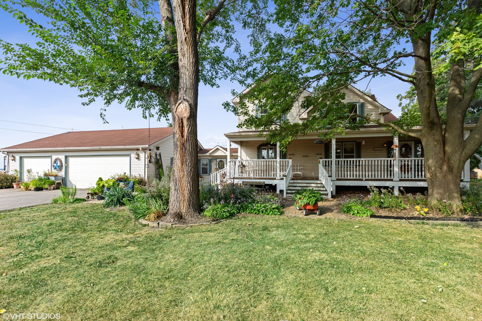 28573 Moose Range Road Sycamore, IL 60178 - Photo 15 of 52 a front view of a house with a yard