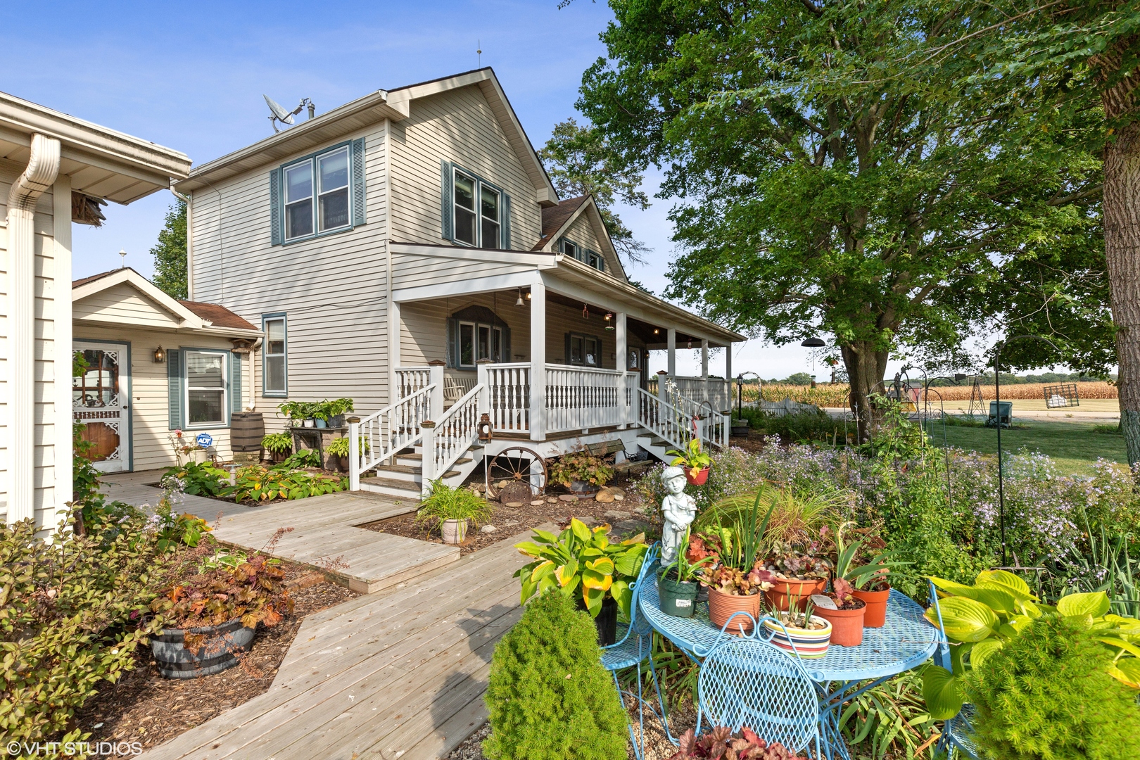28573 Moose Range Road Sycamore, IL 60178 - Photo 17 of 52 a front view of a house with garden