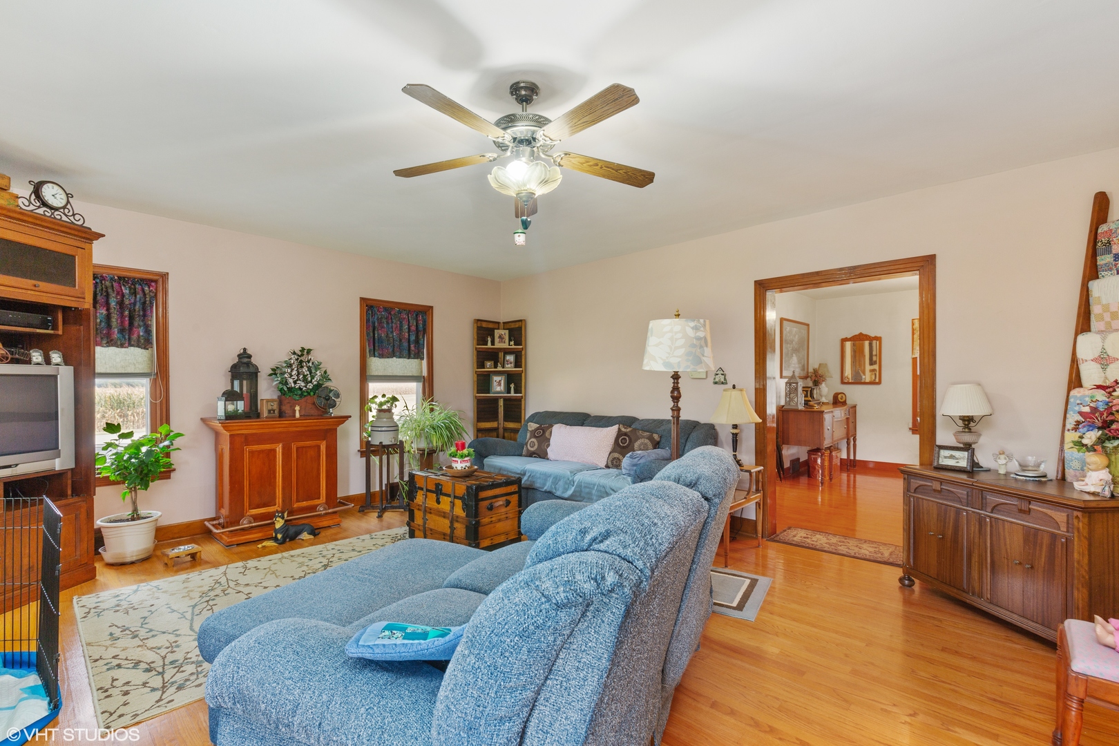 28573 Moose Range Road Sycamore, IL 60178 - Photo 29 of 52 a living room with furniture and wooden floor