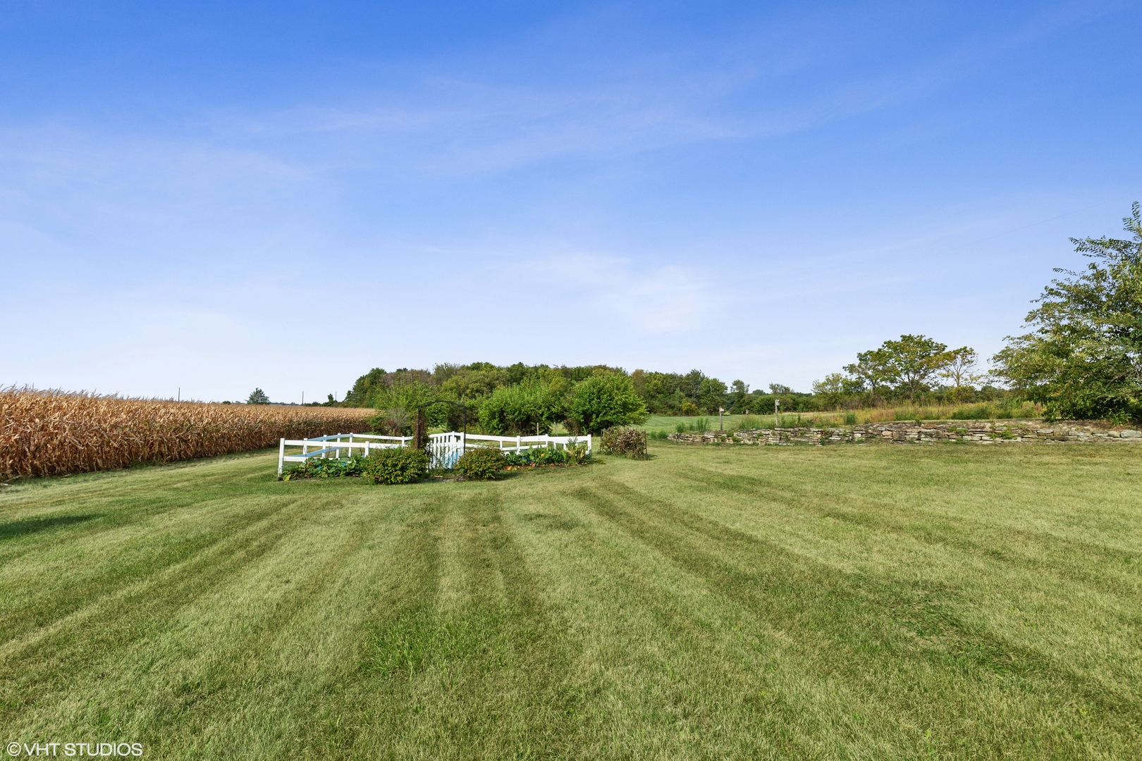 28573 Moose Range Road Sycamore, IL 60178 - Photo 9 of 52 a view of a lake with houses in the background
