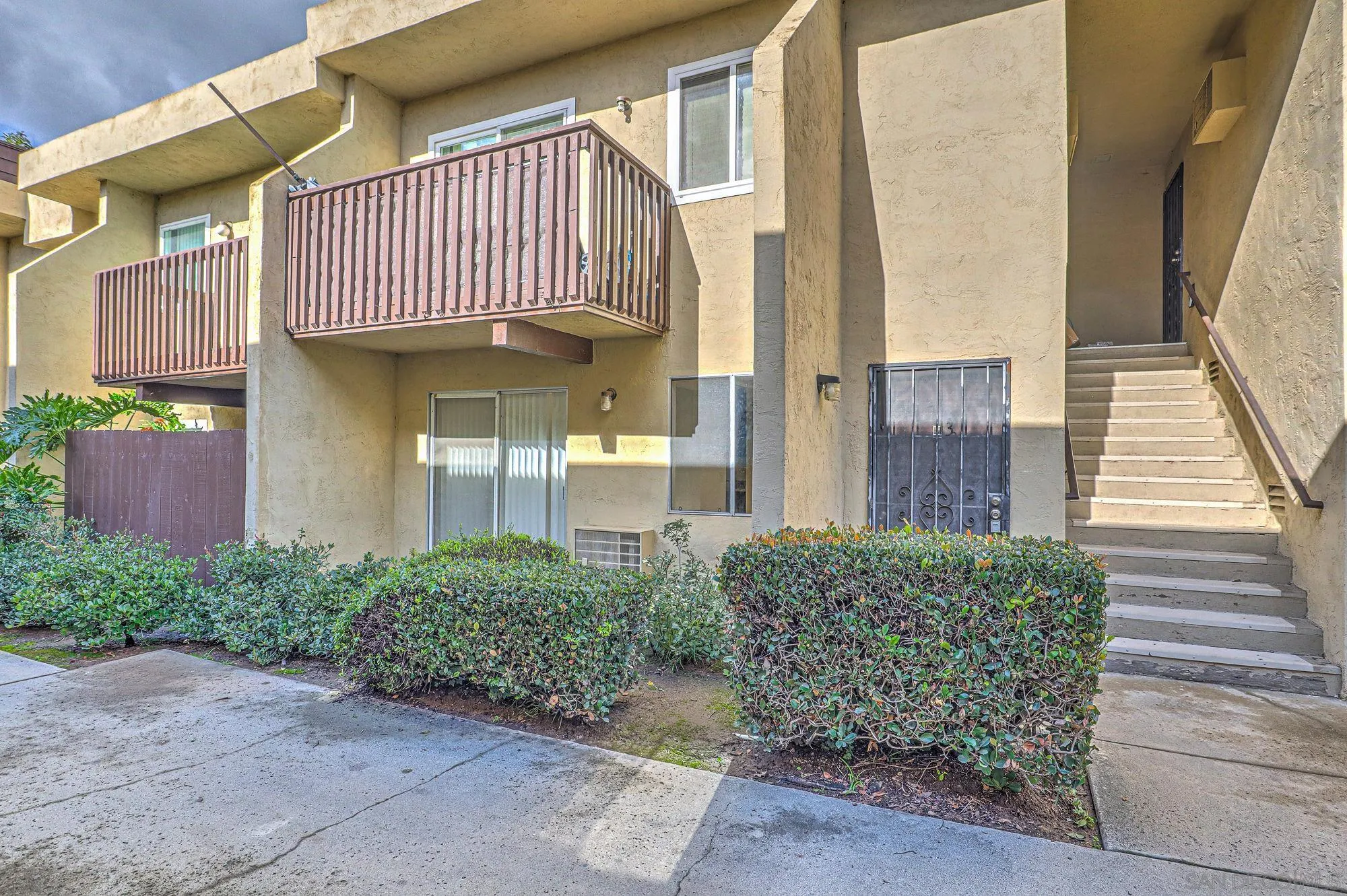 6902 Mission Gorge Road San Diego, CA 92120 - Photo 13 of 14 a view of a house with a yard
