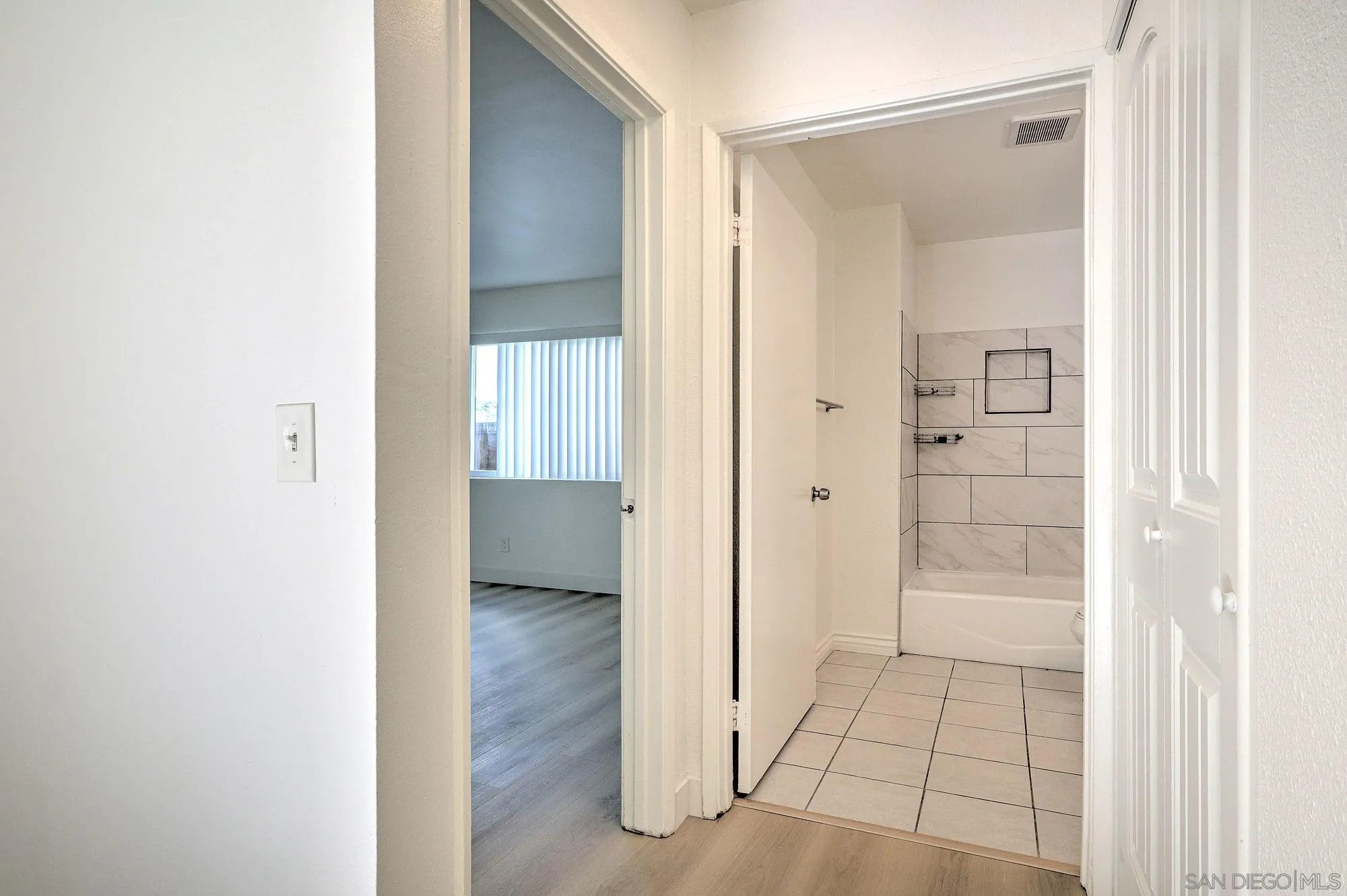 6902 Mission Gorge Road San Diego, CA 92120 - Photo 10 of 14 a view of a bathroom with a shower