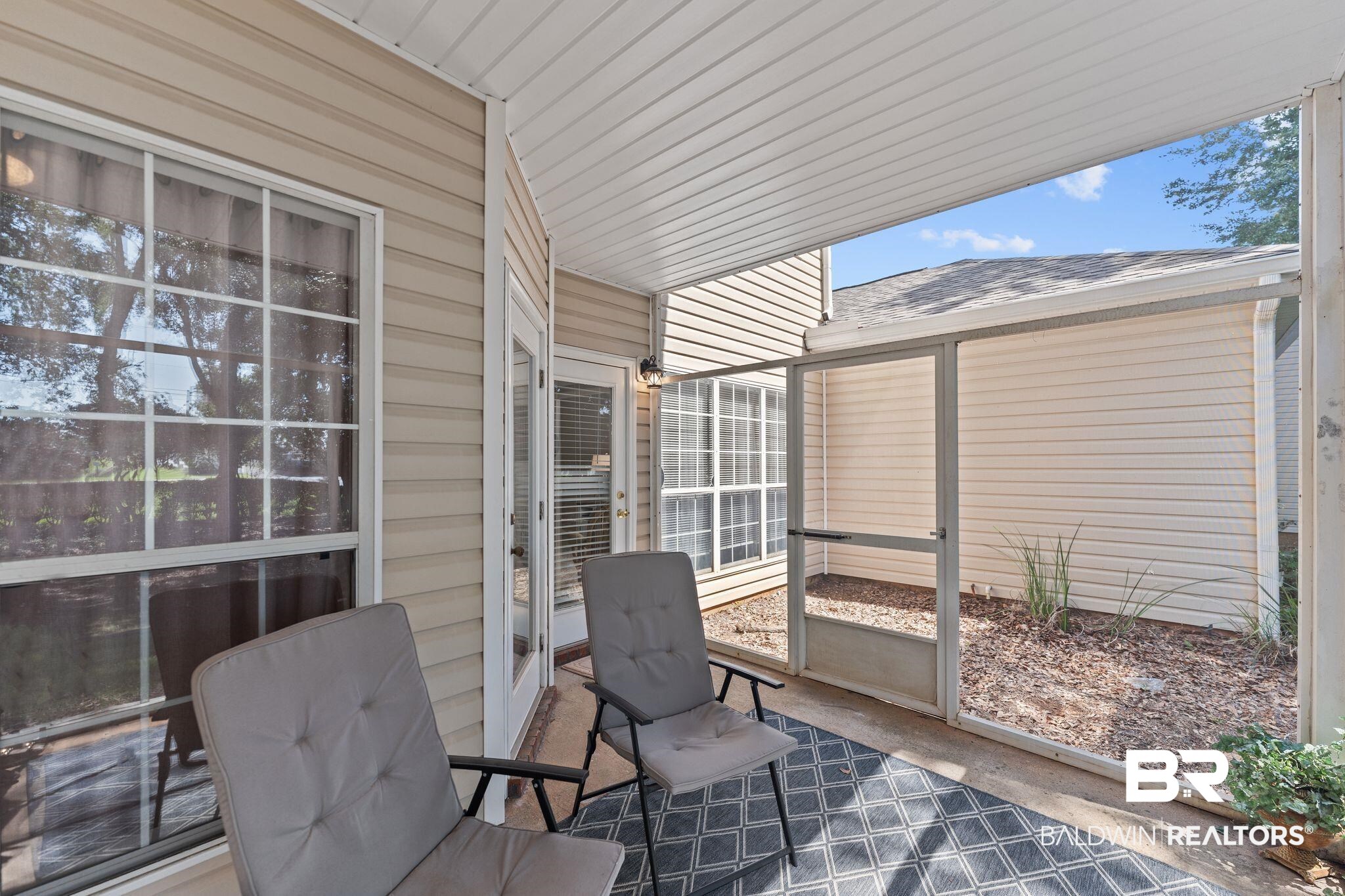 2651 South Juniper Street, Unit 203 Foley, AL 36535 - Photo 21 of 22 View of sunroom / solarium
