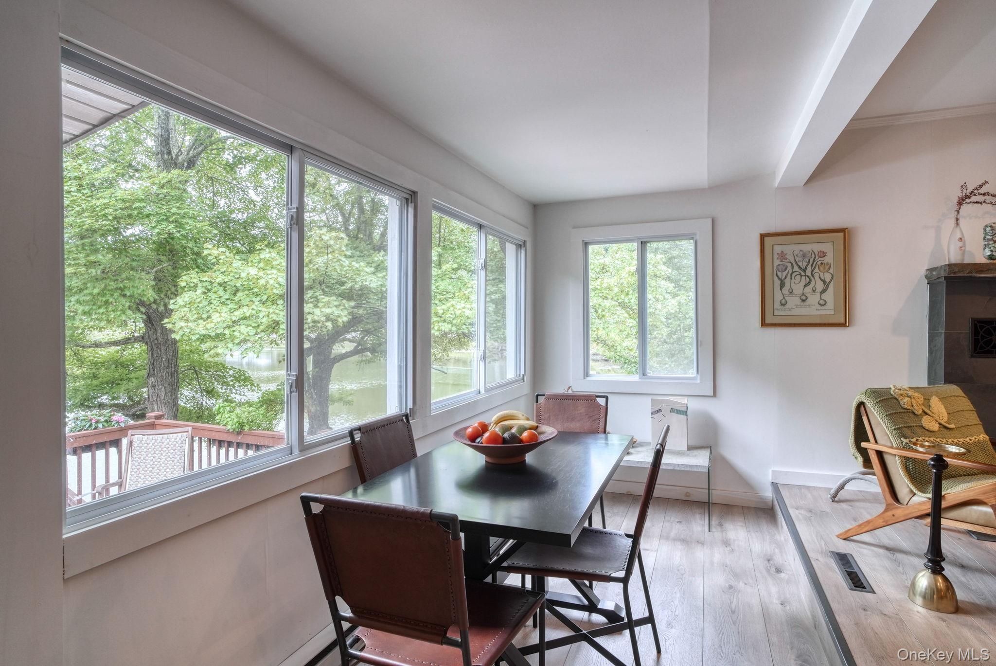2 Bodine Lake Road Yulan, NY 12792 - Photo 14 of 32 a view of a dining room with furniture window and outside view