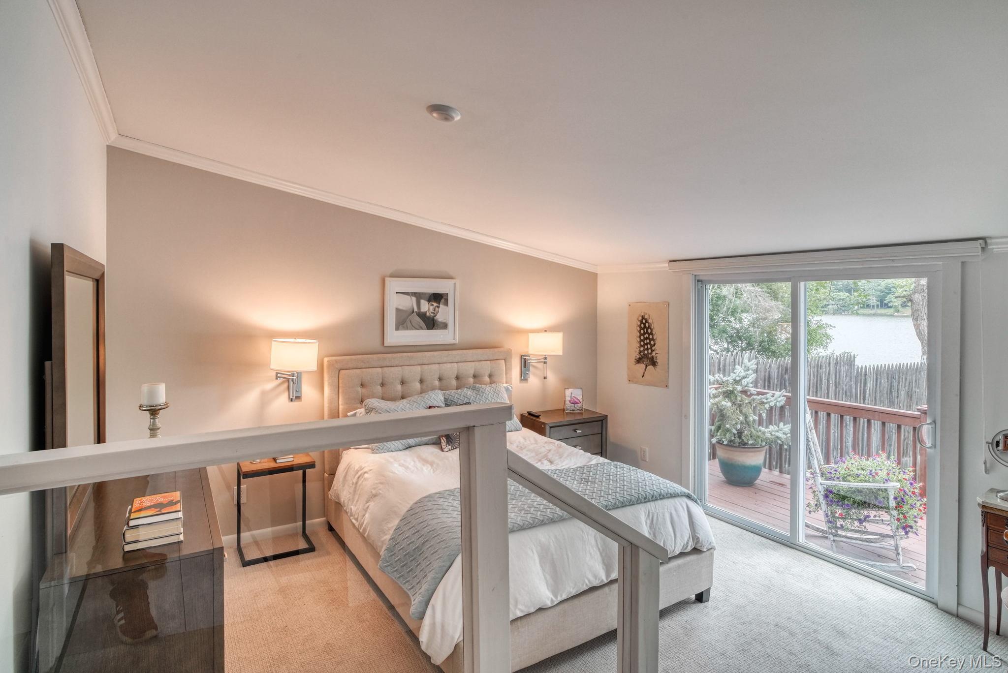 2 Bodine Lake Road Yulan, NY 12792 - Photo 16 of 32 a bedroom with furniture and a large window