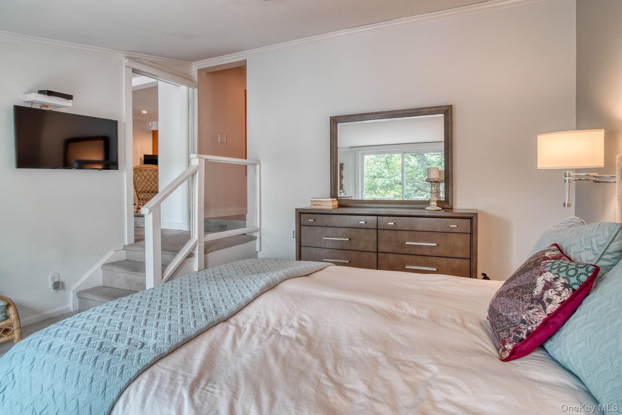 2 Bodine Lake Road Yulan, NY 12792 - Photo 18 of 32 a bed room with a bed and a television