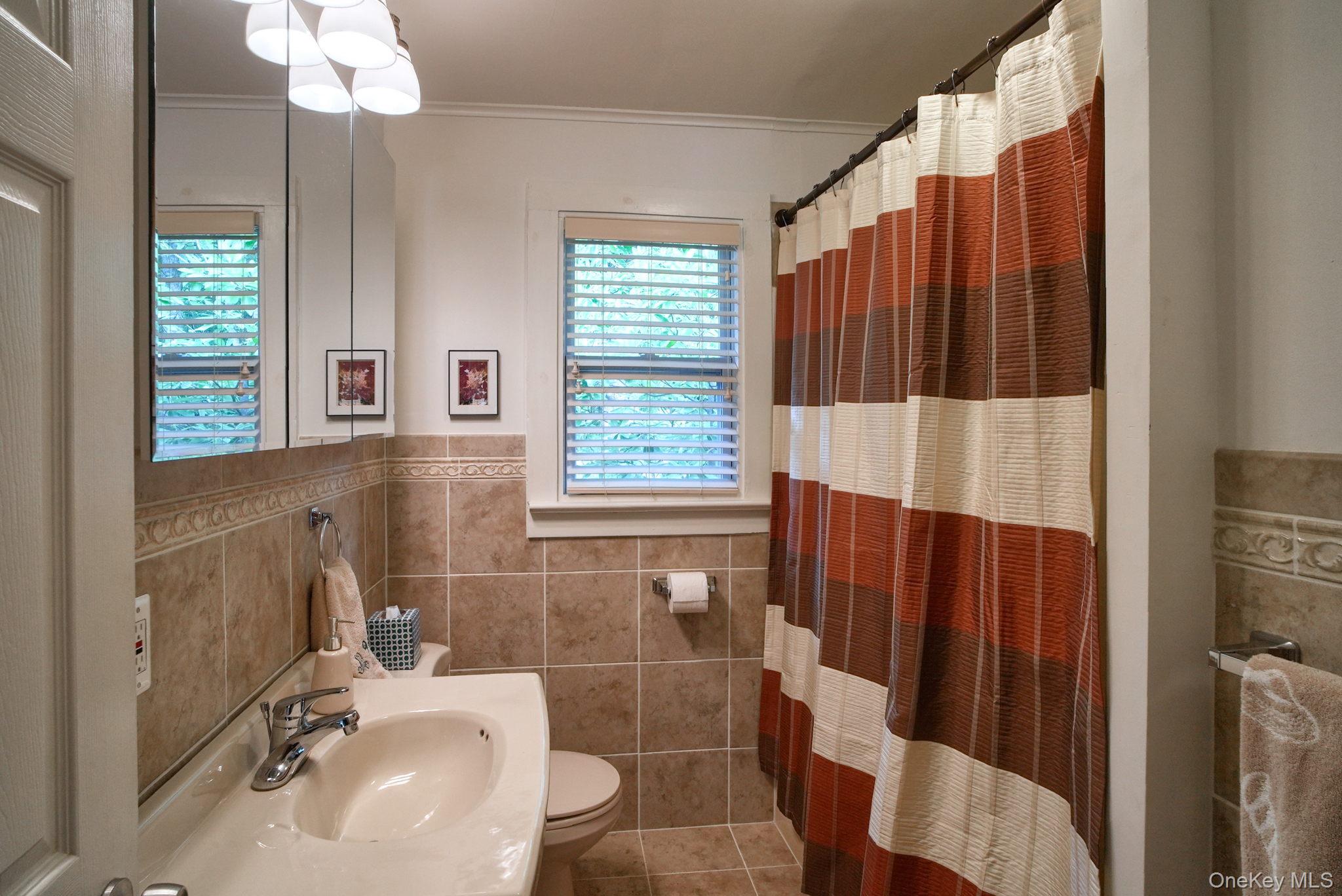 2 Bodine Lake Road Yulan, NY 12792 - Photo 22 of 32 a bathroom with a sink toilet and shower