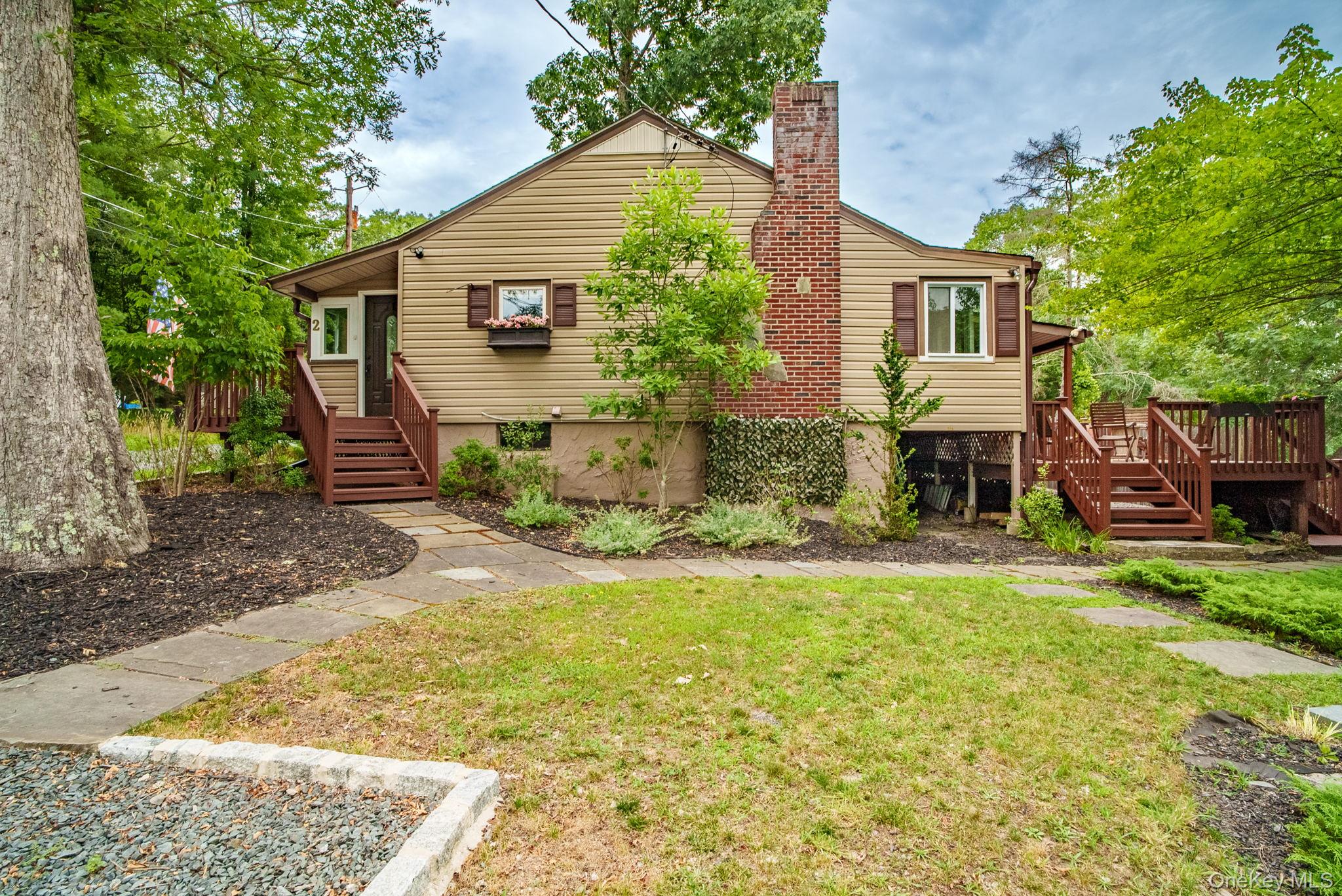 2 Bodine Lake Road Yulan, NY 12792 - Photo 7 of 32 front view of a house with a yard