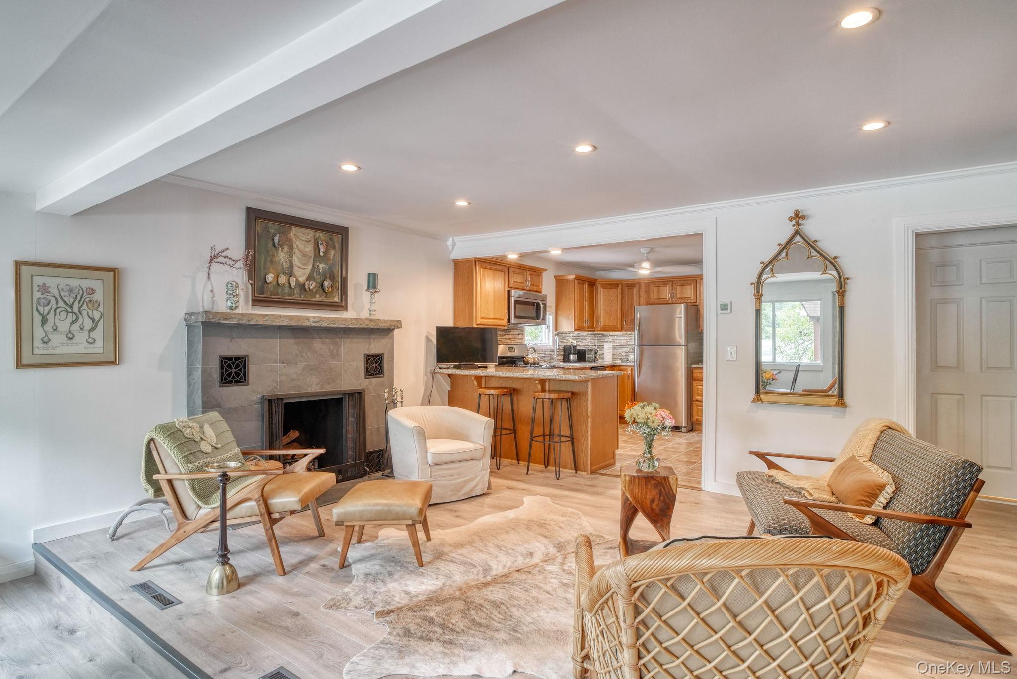 2 Bodine Lake Road Yulan, NY 12792 - Photo 9 of 32 a living room with furniture and a fireplace
