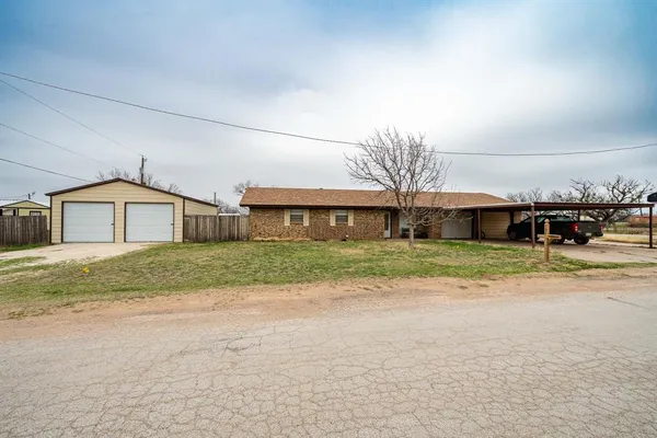 a front view of house with yard