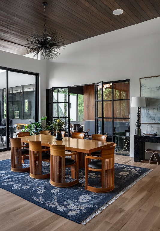 1001 Madrone Road West Lake Hills, TX 78746 - Photo 12 of 40 a view of a dining room with furniture window and wooden floor