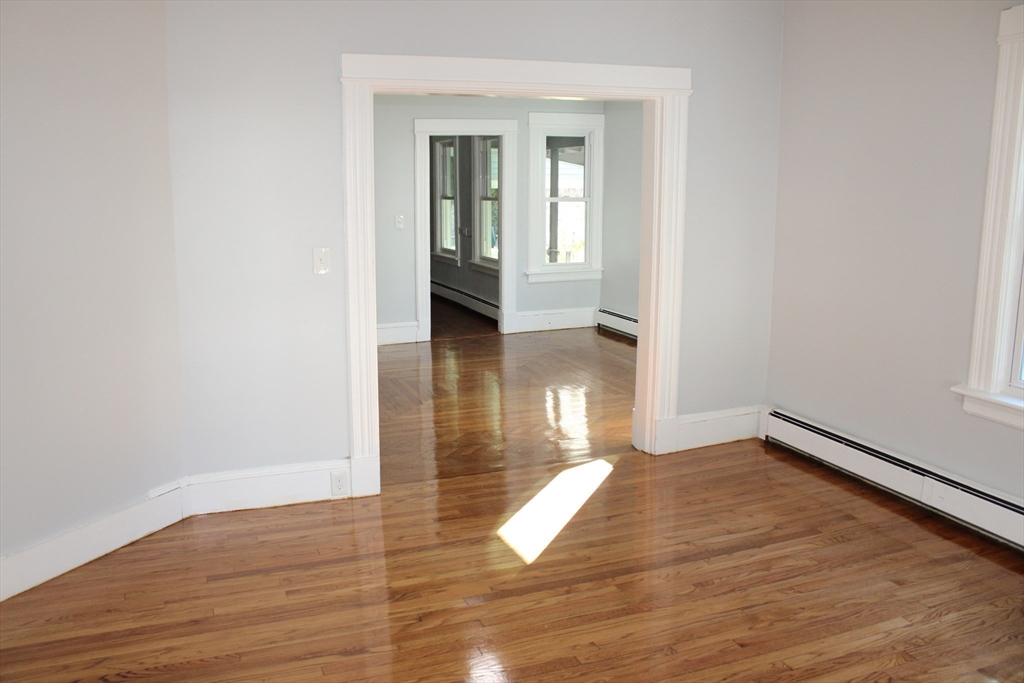 25 Malden Street Springfield, MA 01108 - Photo 17 of 25 a view of a room with wooden floor and a window