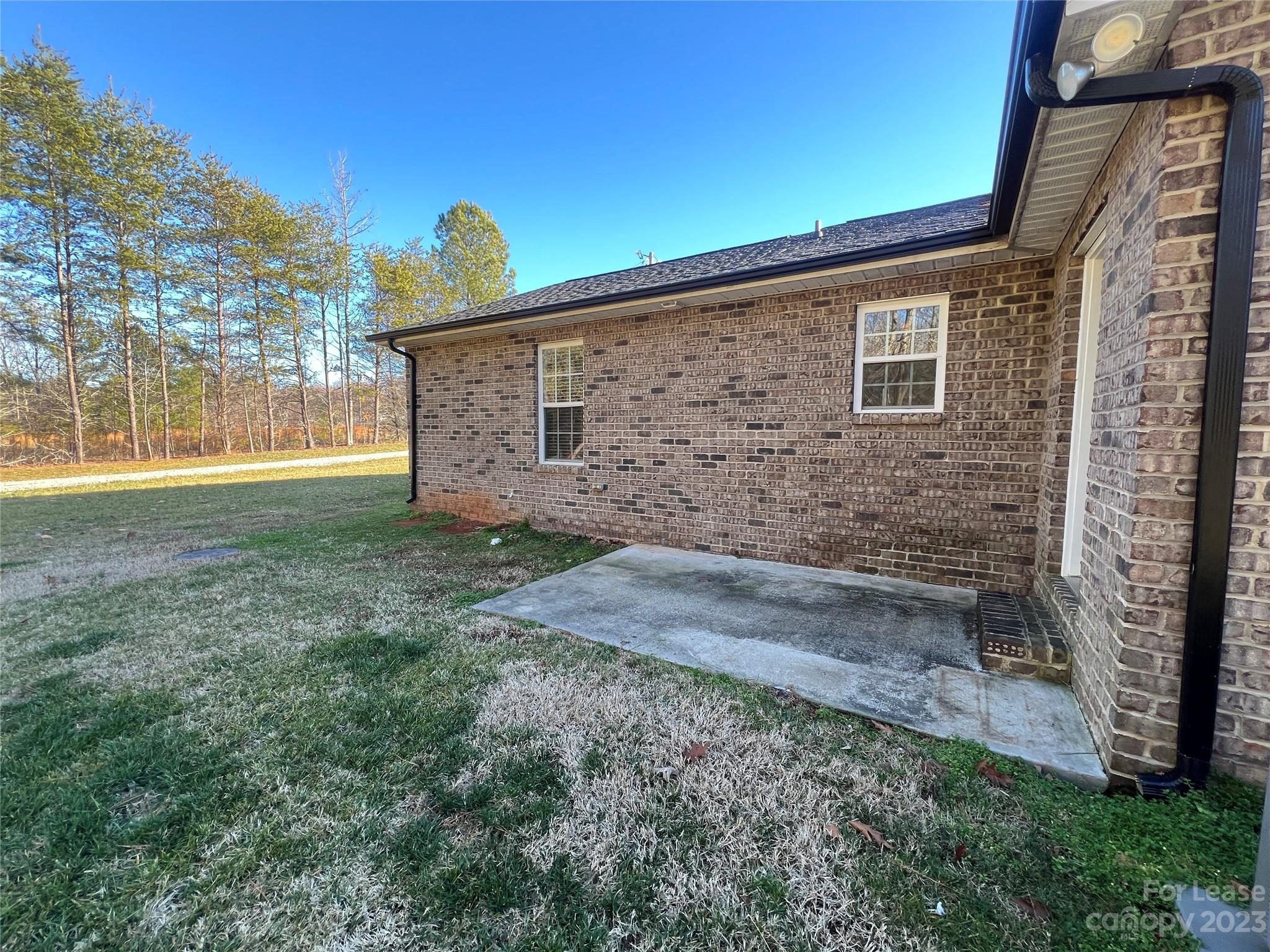 3835 Lee Moore Road Maiden, NC 28650 - Photo 15 of 16 a view of a backyard of the house