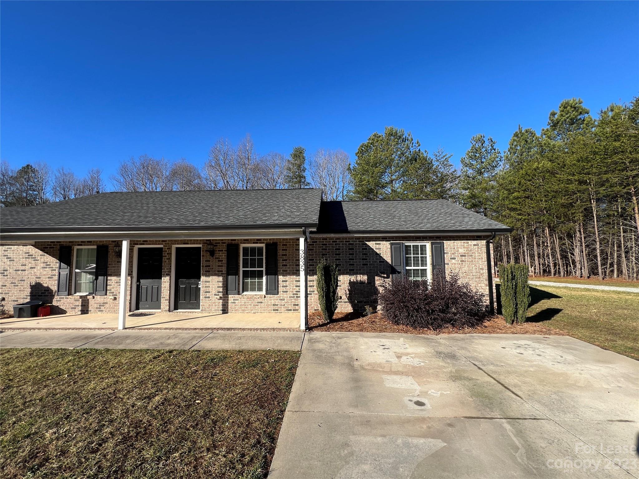 3835 Lee Moore Road Maiden, NC 28650 - Photo 2 of 16 a front view of a house with a yard