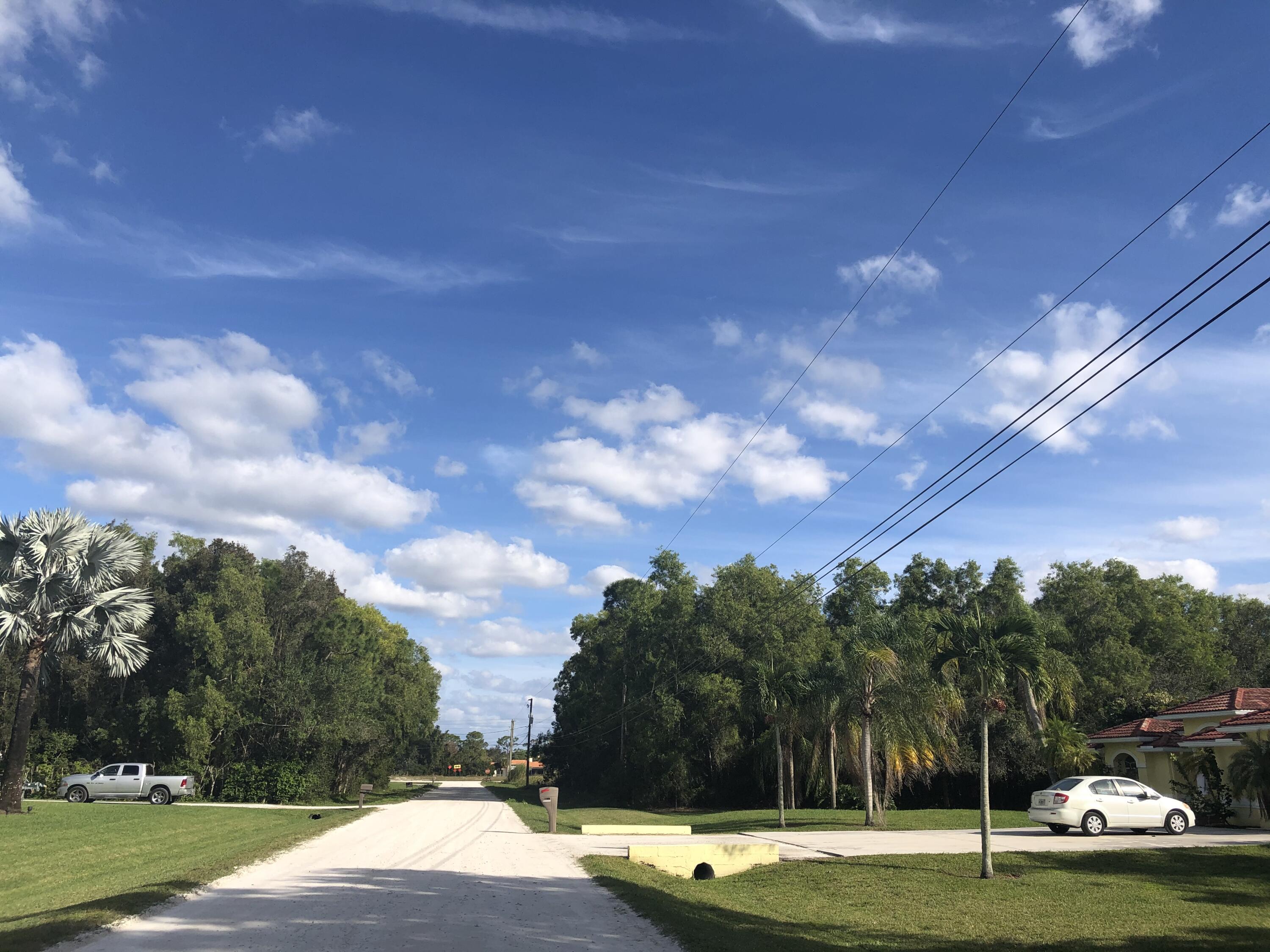 12136 88th Place North West Palm Beach, FL 33412 - Photo 14 of 29 a view of a parking area