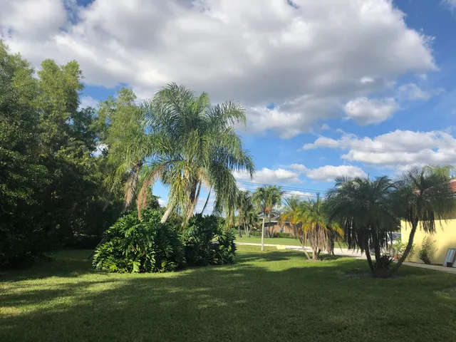 a view of a golf course with a garden