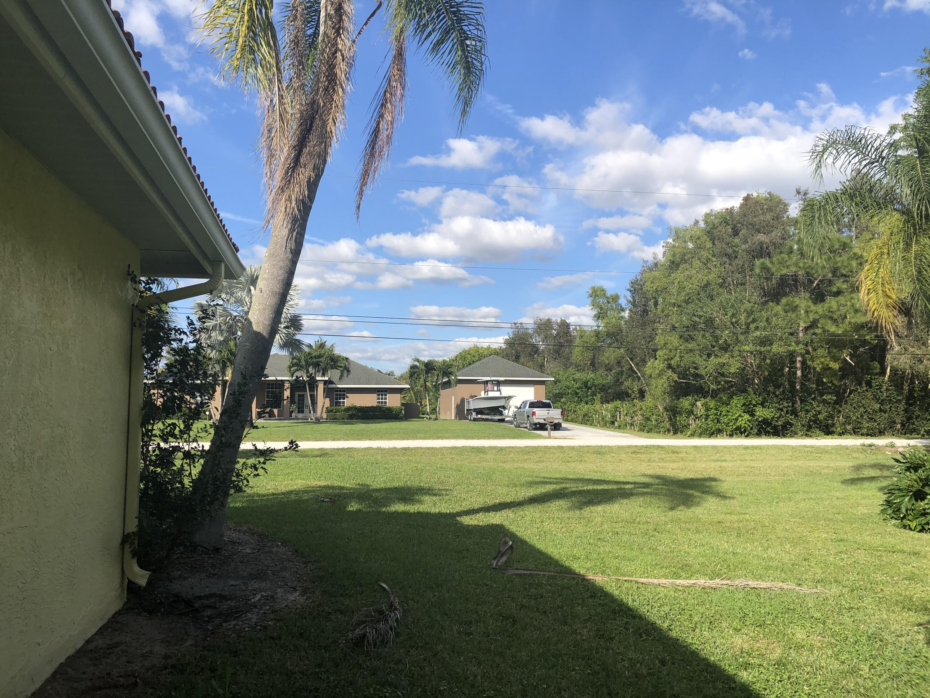 12136 88th Place North West Palm Beach, FL 33412 - Photo 20 of 29 a view of an outdoor space