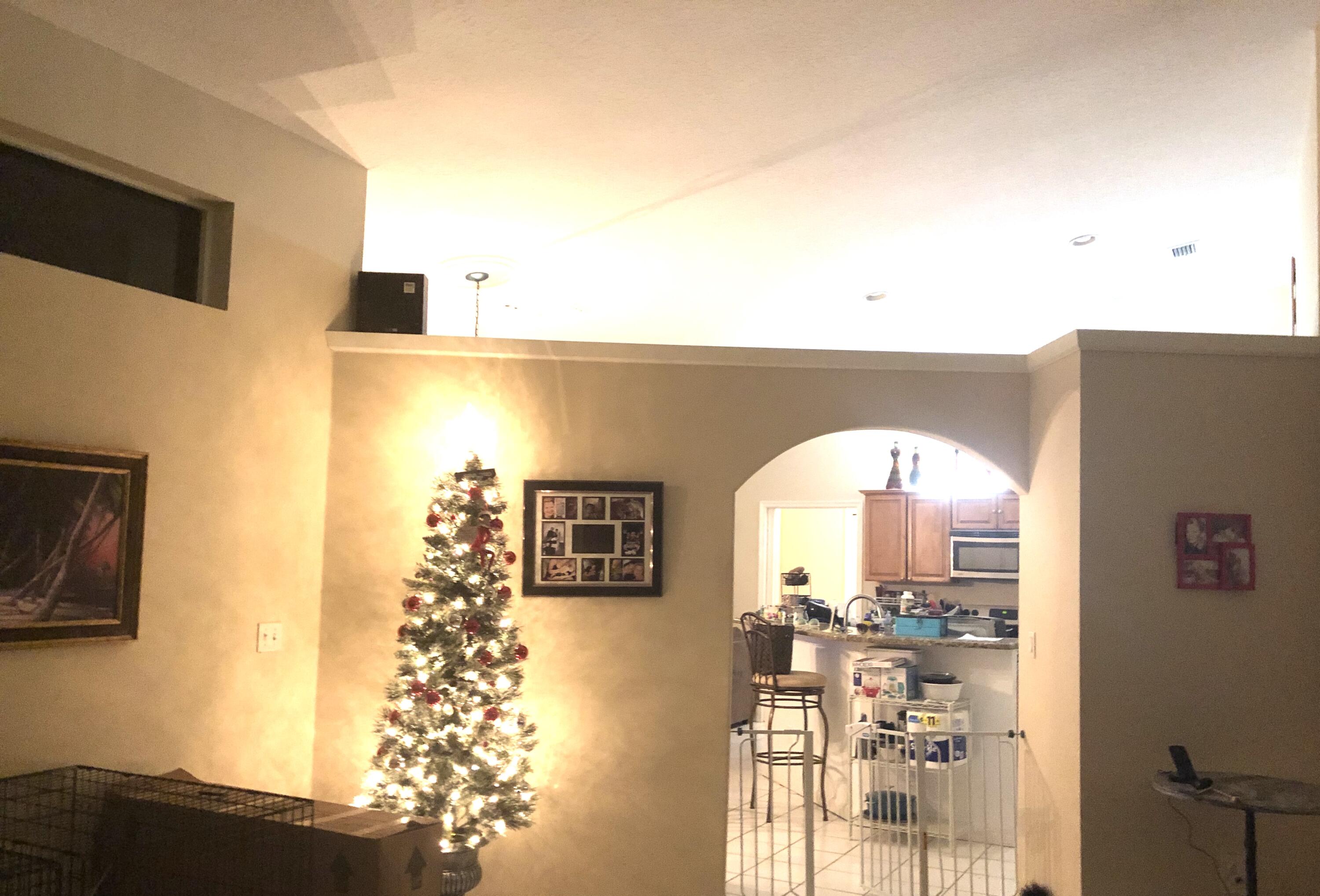 12136 88th Place North West Palm Beach, FL 33412 - Photo 9 of 29 a view of living room with a flat screen tv