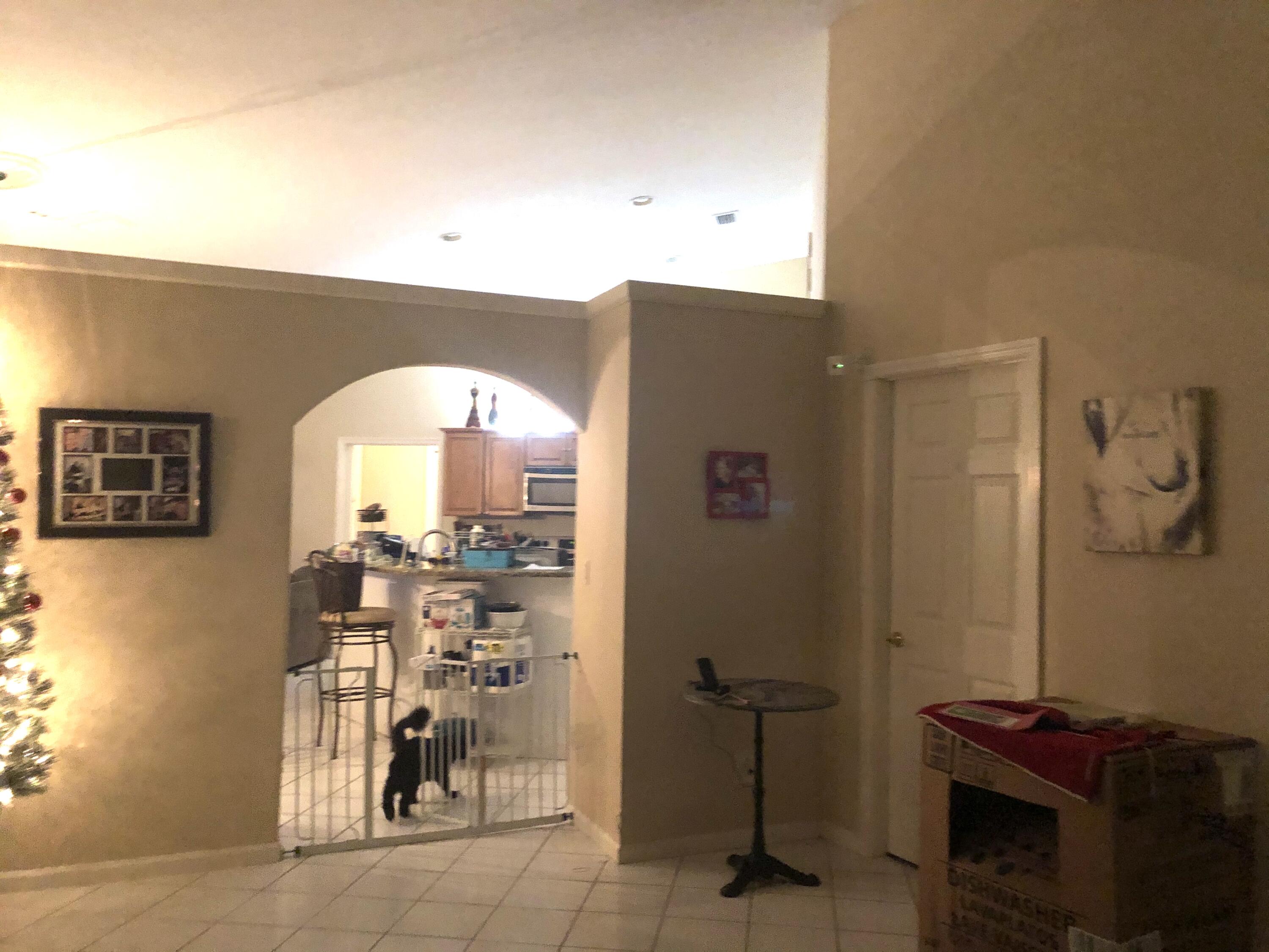 12136 88th Place North West Palm Beach, FL 33412 - Photo 10 of 29 a view of a hallway with workspace