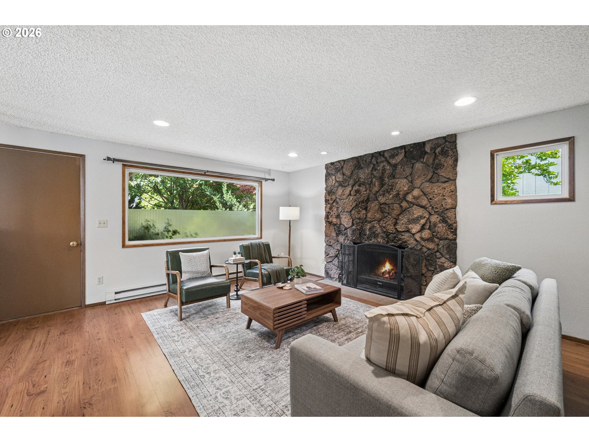 255 West Berkeley Street Gladstone, OR 97027 - Photo 9 of 37 a living room with fireplace furniture and a large window