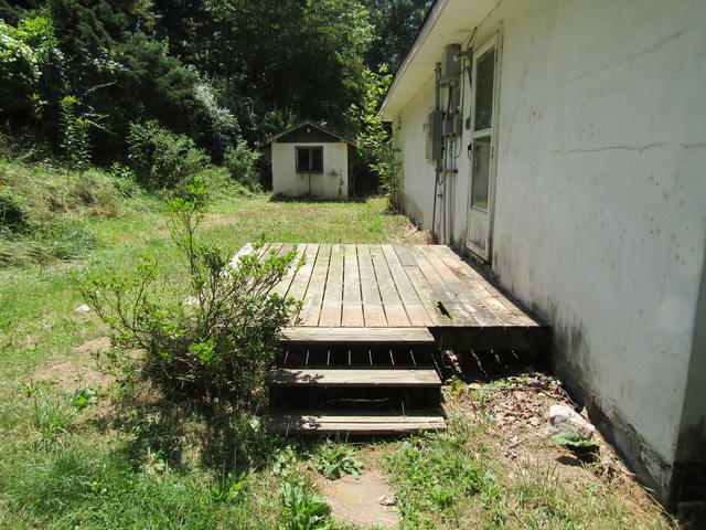 4816 Brush Creek Road Riner, VA 24149 - Photo 13 of 17 a view of balcony with wooden floor and outdoor space