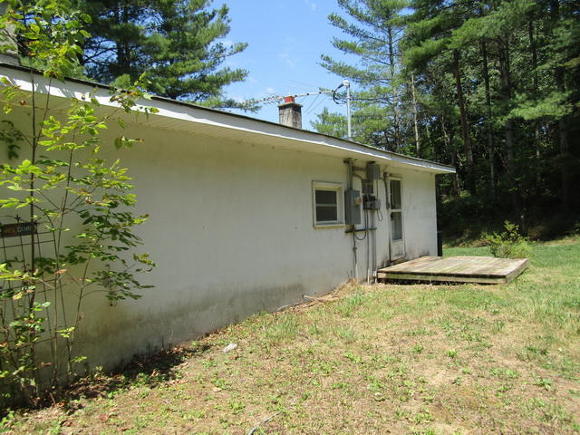 4816 Brush Creek Road Riner, VA 24149 - Photo 4 of 17 a front view of a house with a yard
