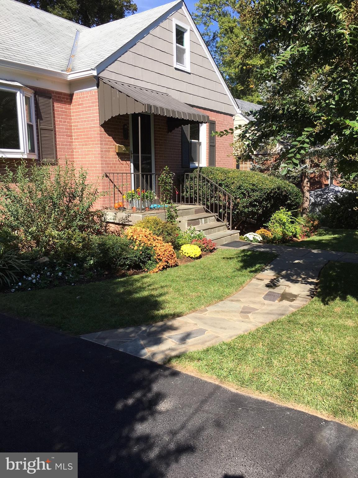 511 Mansfield Road Silver Spring, MD 20910 - Photo 1 of 29 a front view of a house with garden