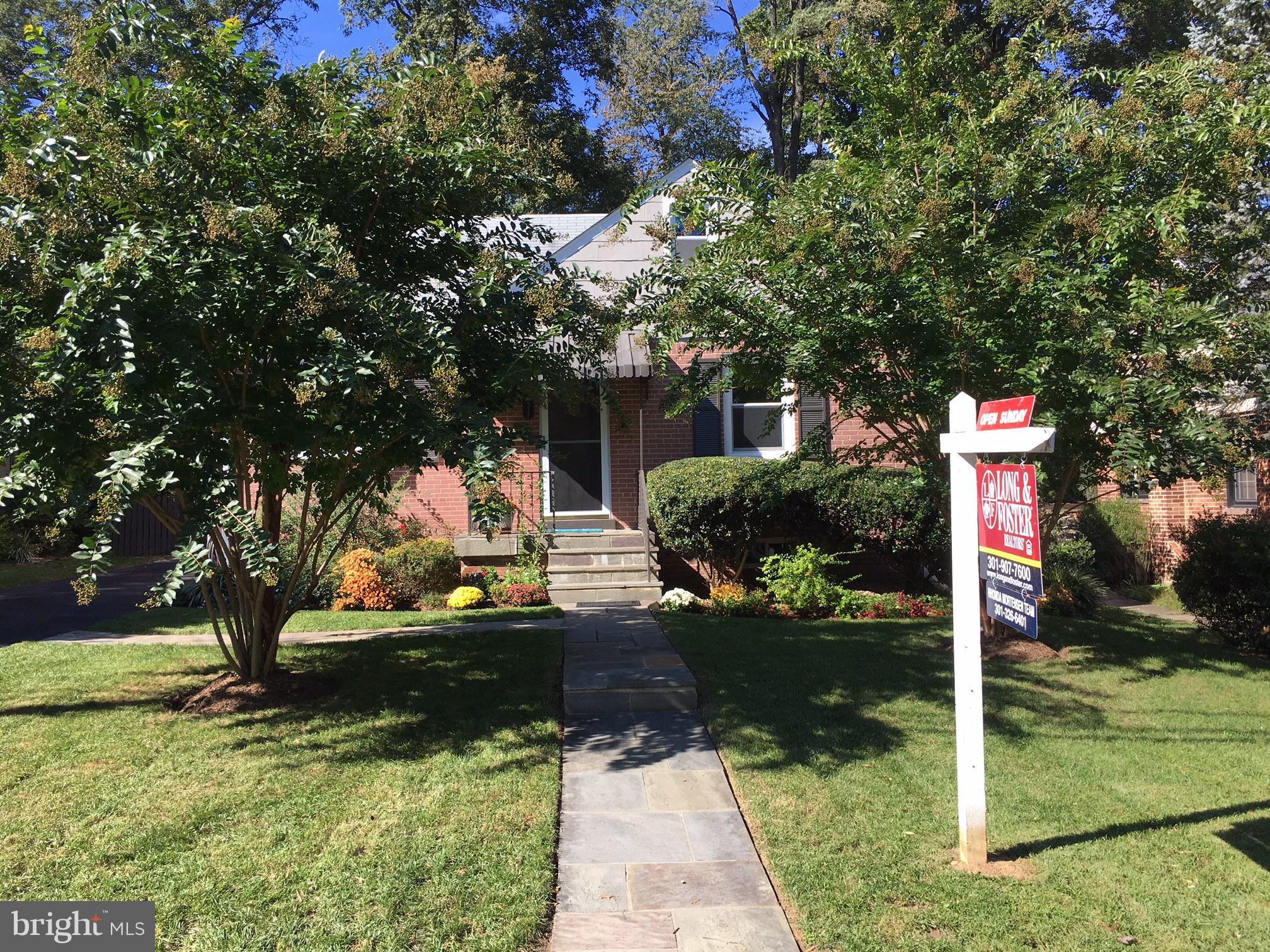 511 Mansfield Road Silver Spring, MD 20910 - Photo 2 of 29 a front view of a house with garden