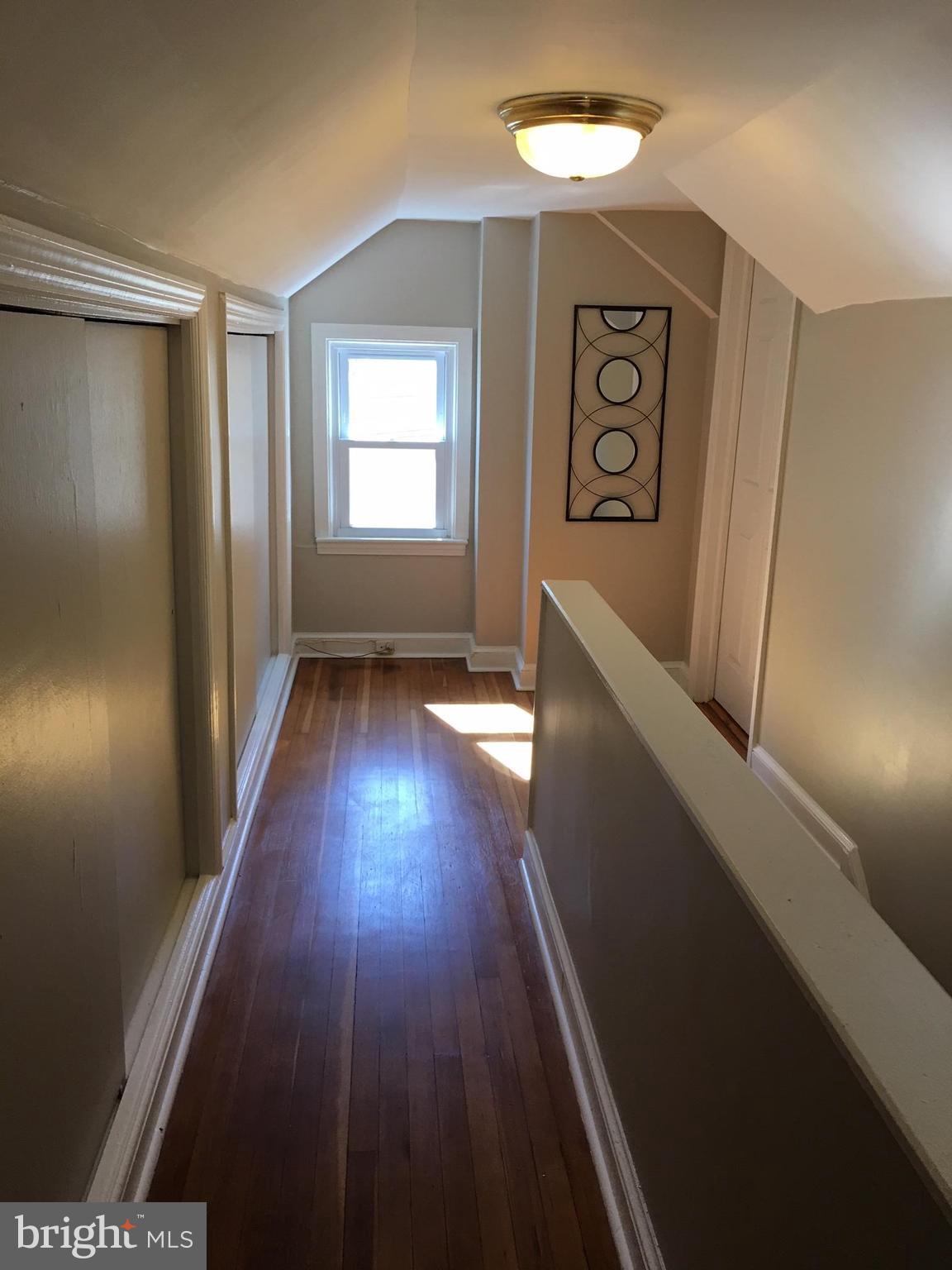 511 Mansfield Road Silver Spring, MD 20910 - Photo 16 of 29 a view of hallway with wooden floor