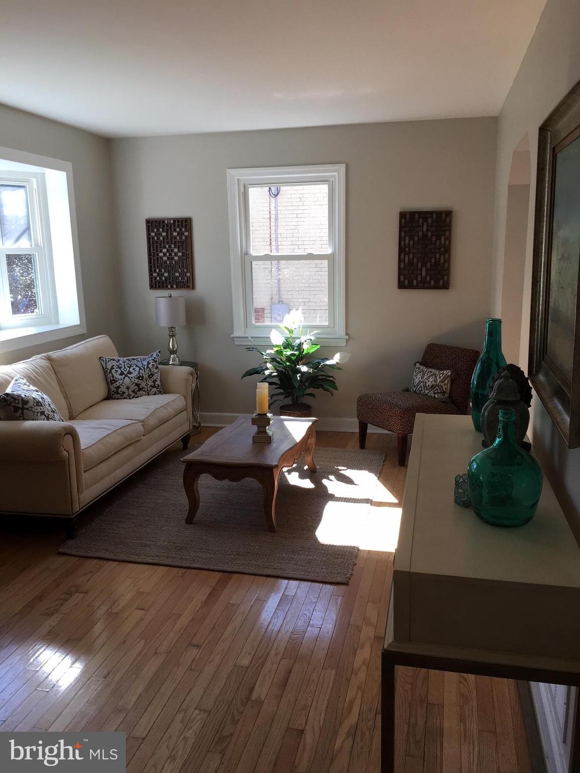511 Mansfield Road Silver Spring, MD 20910 - Photo 6 of 29 a living room with furniture and a large window