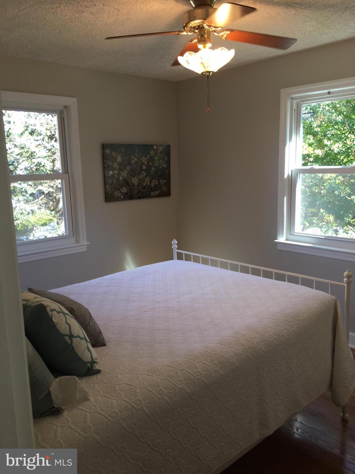 511 Mansfield Road Silver Spring, MD 20910 - Photo 7 of 29 a bedroom with a bed and a window