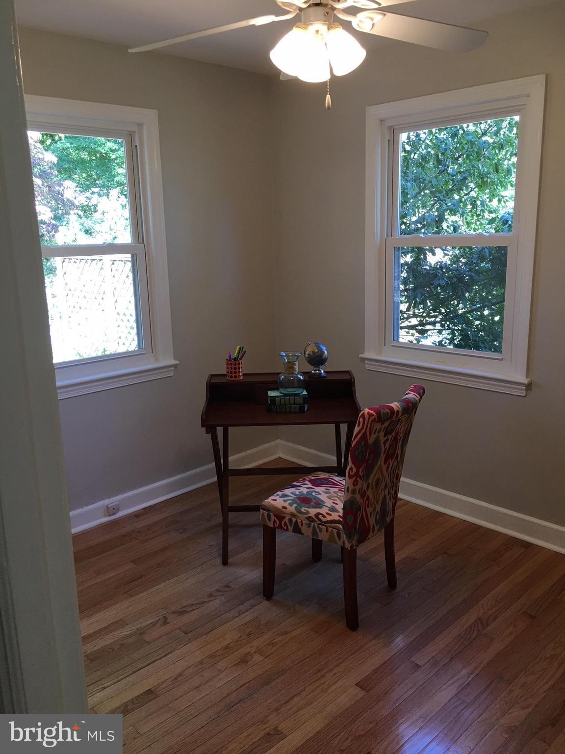 511 Mansfield Road Silver Spring, MD 20910 - Photo 9 of 29 a view of a workspace with furniture and a window