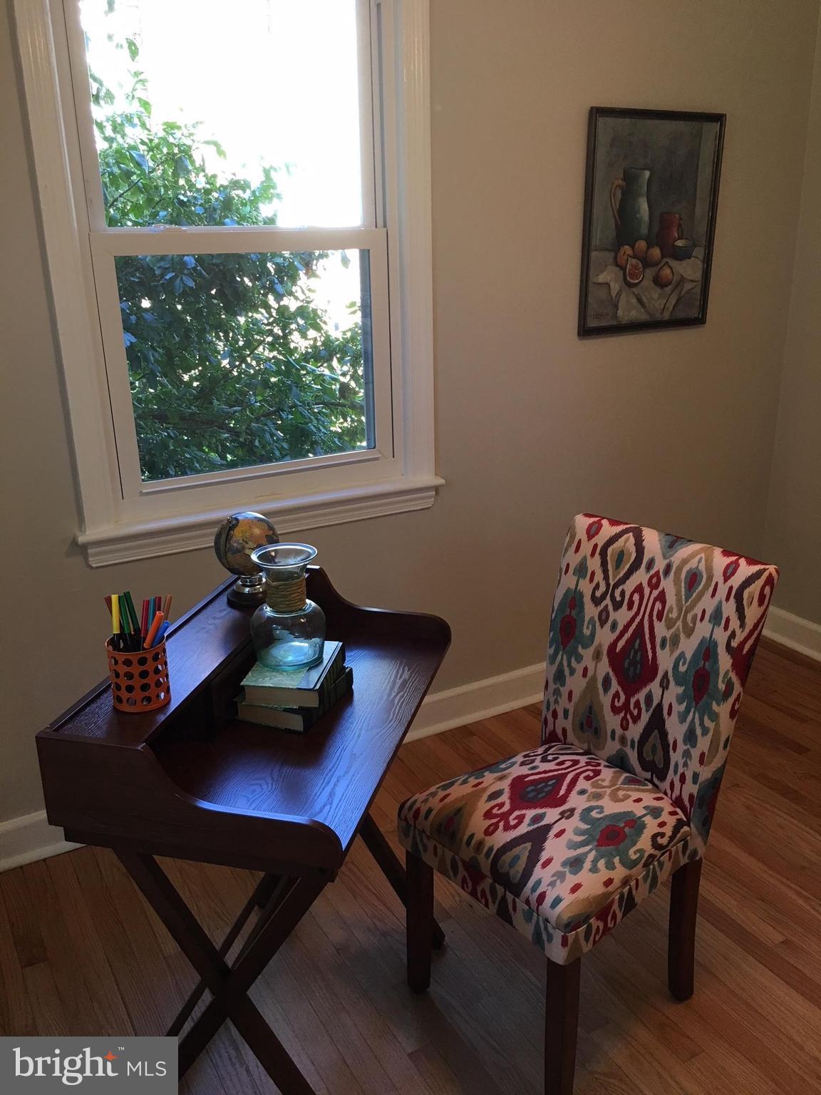 511 Mansfield Road Silver Spring, MD 20910 - Photo 10 of 29 a living room with furniture and a window