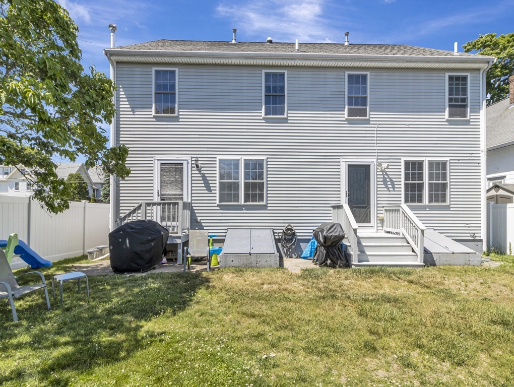 13 Shawmut Avenue, Unit 13 Mansfield, MA 02048 - Photo 29 of 34 a front view of a house with a garden