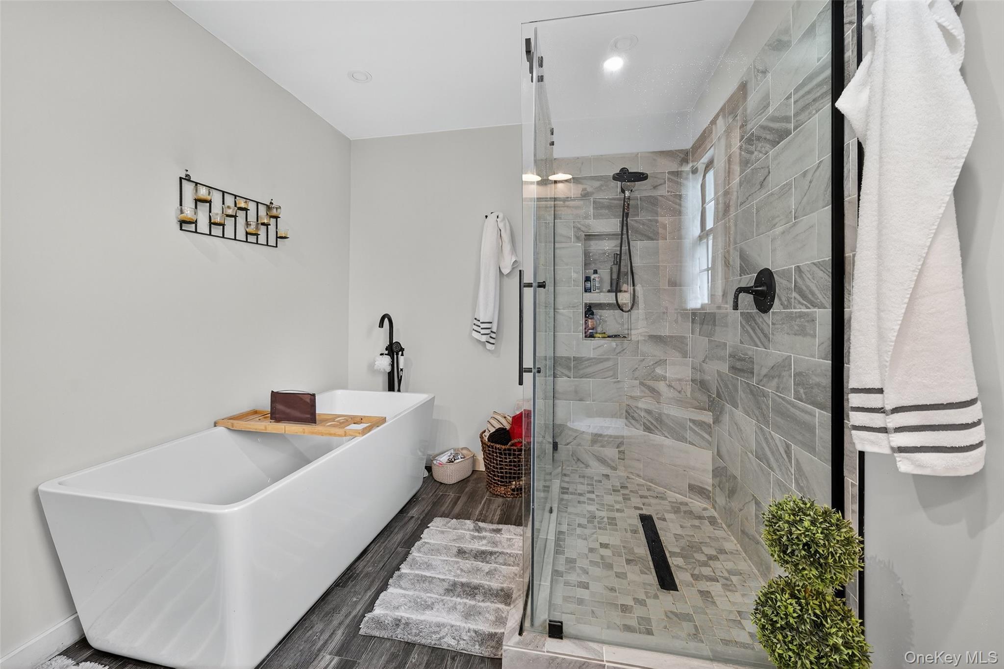 214 Dubois Road Gardiner, NY 12561 - Photo 23 of 38 a bathroom with a tub sink shower and mirror