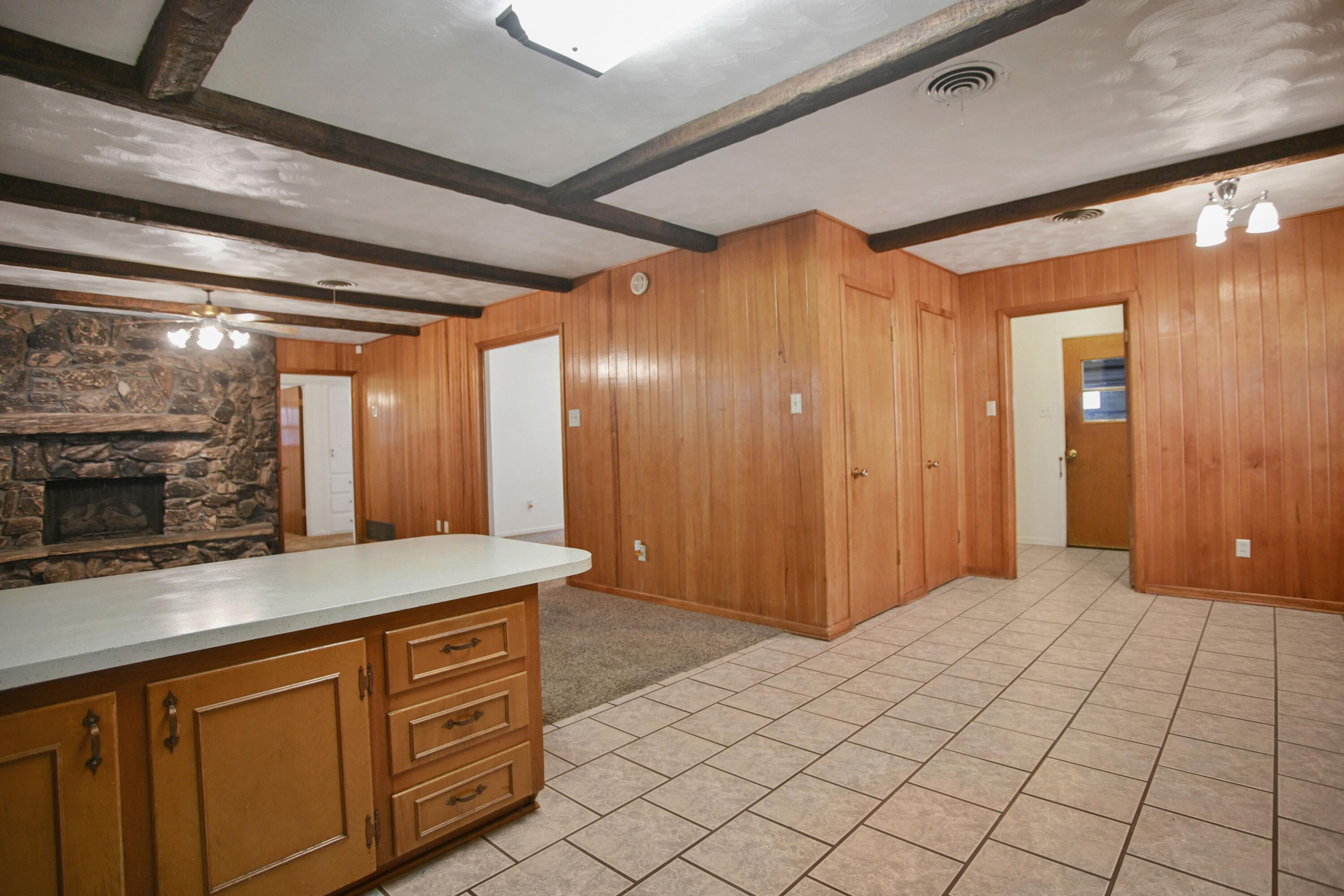 5420 8th Street Lubbock, TX 79416 - Photo 13 of 35 a spacious bathroom with a granite countertop sink and a mirror