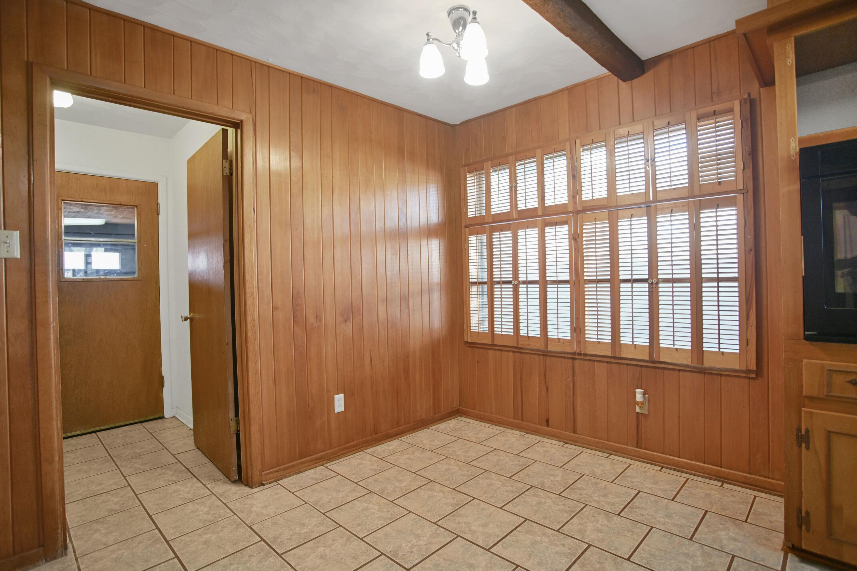 5420 8th Street Lubbock, TX 79416 - Photo 15 of 35 wooden floor and windows in a room