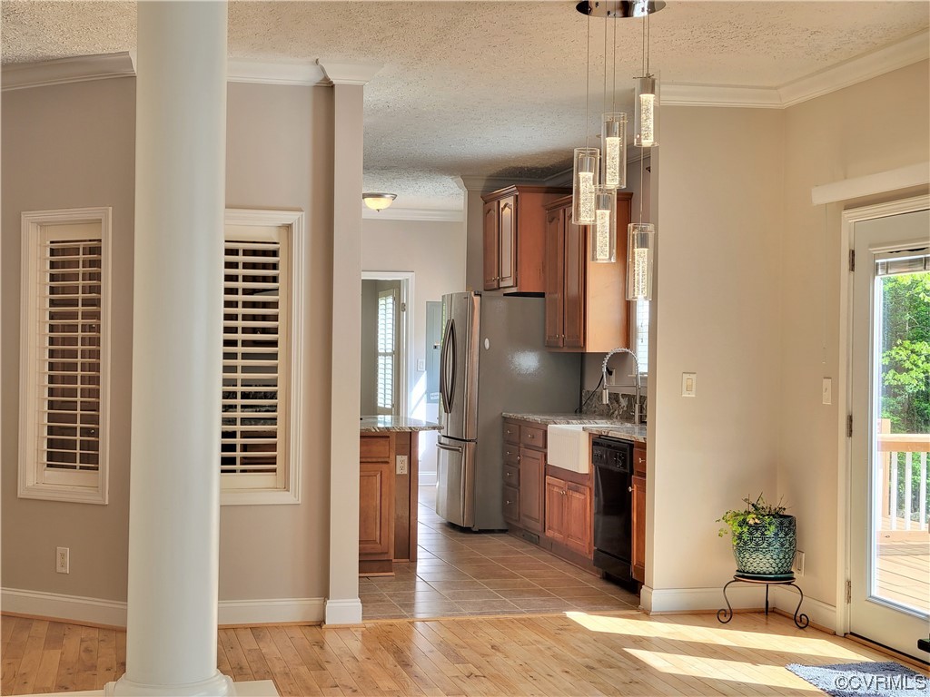 13569 Greenwood Road Glen Allen, VA 23059 - Photo 12 of 49 a kitchen with stainless steel appliances a refrigerator and a window