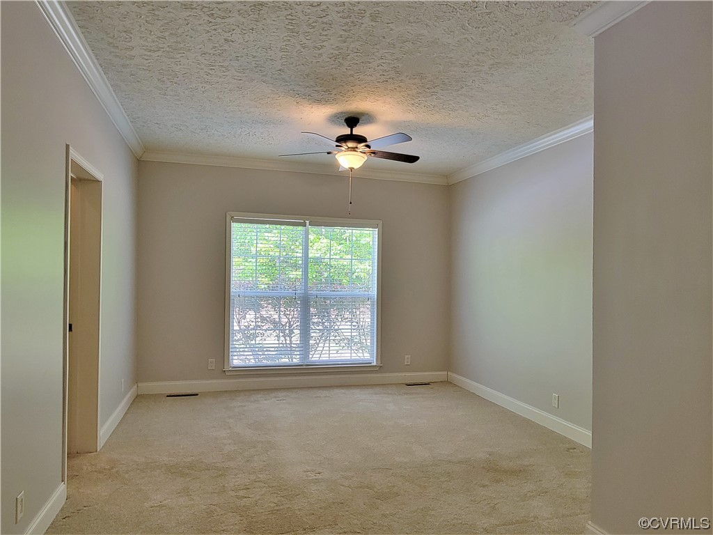 13569 Greenwood Road Glen Allen, VA 23059 - Photo 14 of 49 an empty room with fan and windows