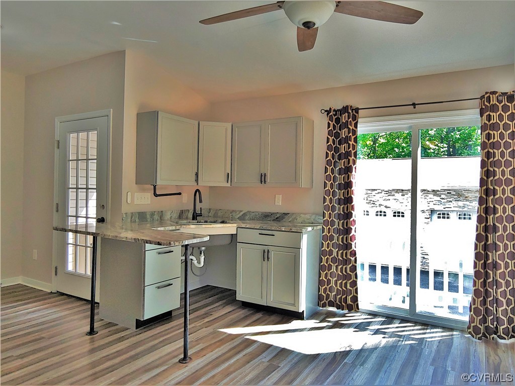 13569 Greenwood Road Glen Allen, VA 23059 - Photo 27 of 49 a kitchen with a sink and large window