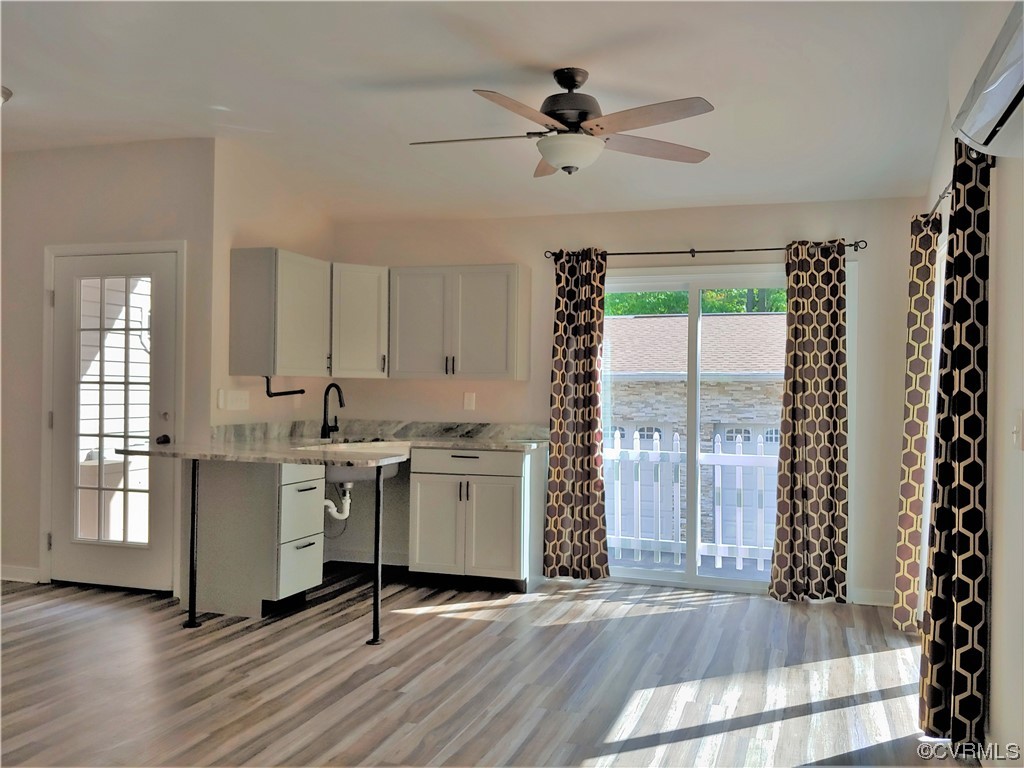 13569 Greenwood Road Glen Allen, VA 23059 - Photo 29 of 49 a view of a room with a window and wooden floor